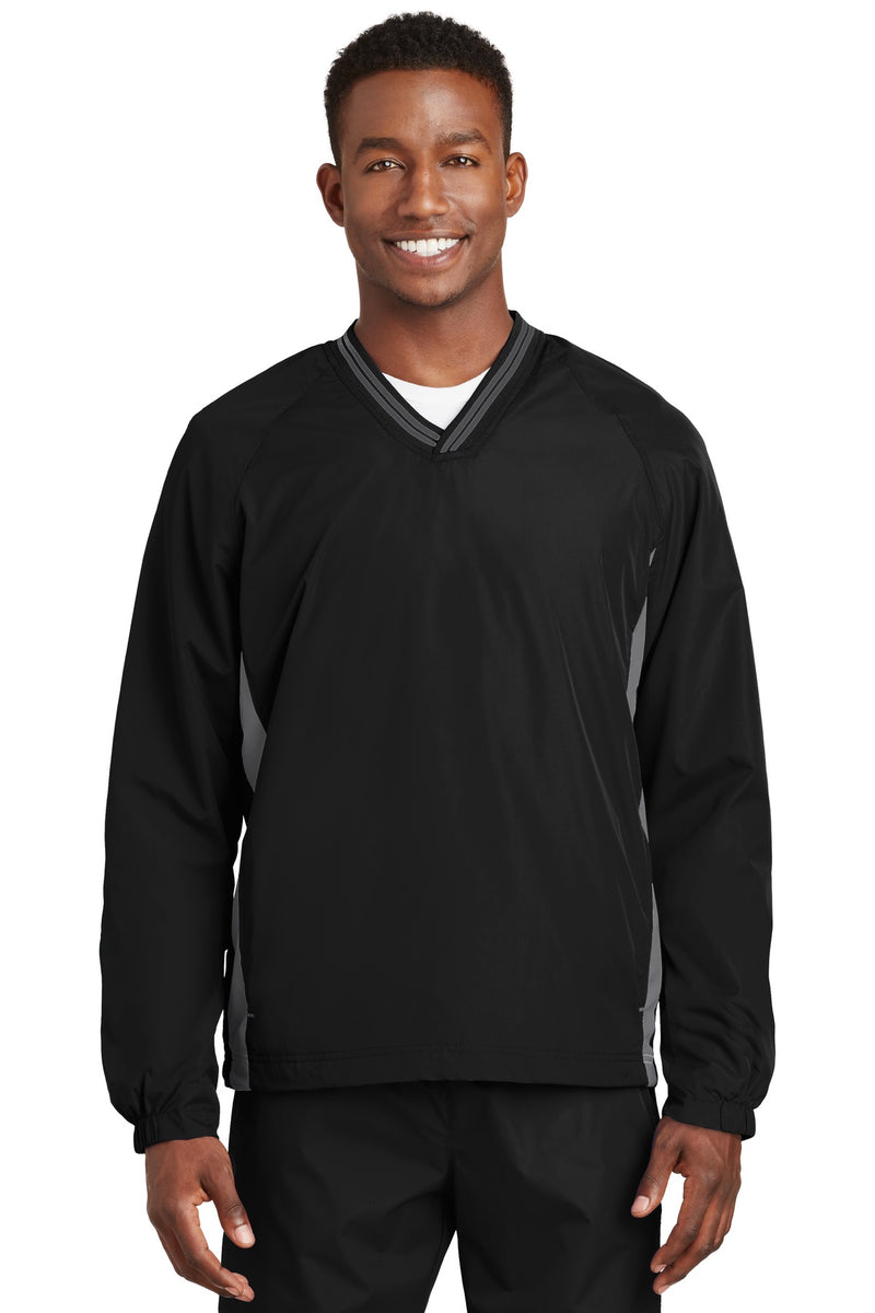 Load image into Gallery viewer, Sport-Tek Tipped V-Neck Raglan Wind Shirt. JST62
